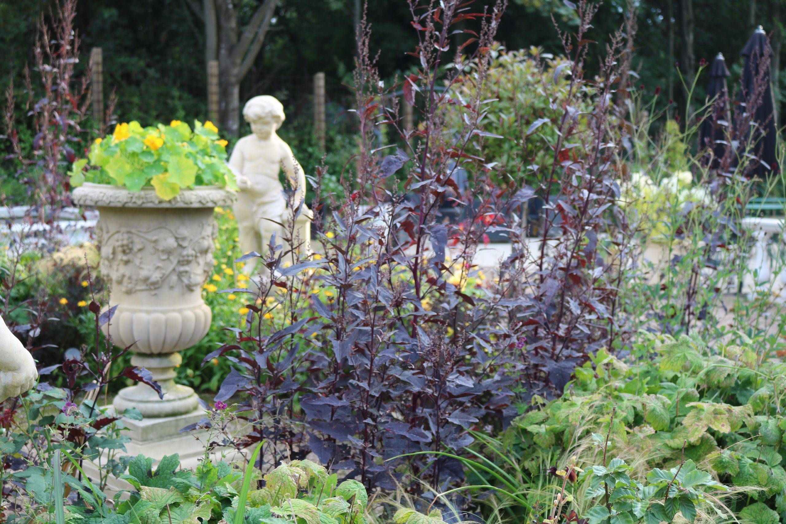 Florentine urn and fire statur